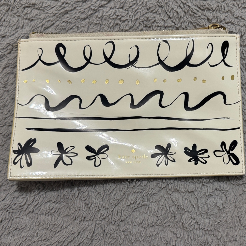 Kate Spade Cream Clutch with Black and Gold Accents